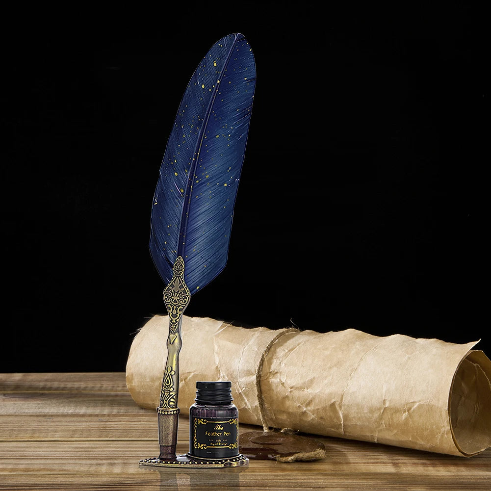 Blue feather quill with gold-coloured speckles, standing beside its bottle on a wooden writing table with rolled paper.