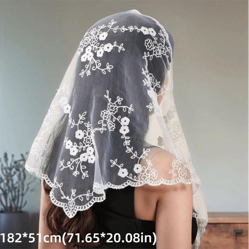 White floral lace triangle headscarf over dark hair, with scalloped borders and printed dimensions.