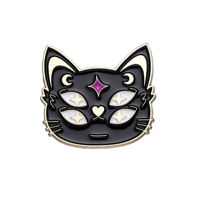 Black cat face enamel pin on white with four pale eyes, crescent moons, fine whiskers and a purple star-shaped forehead accent.