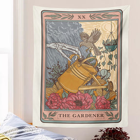 The Gardener wall tapestry above a bed, showing the yellow watering can, birds and floral foreground within a rectangular border.