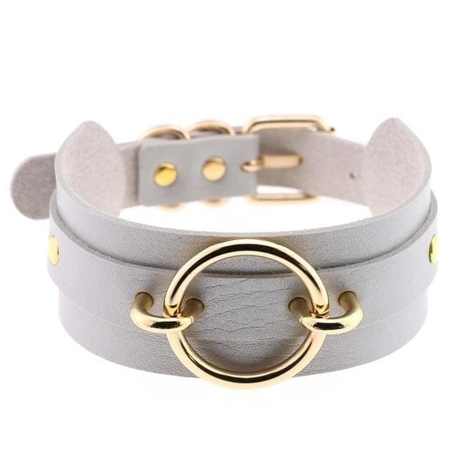 Light gray double-layered vegan leather o-ring choker necklace with a gold-toned circular ring centerpiece and matching hardware