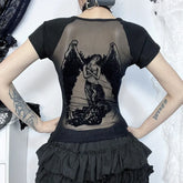 Black gothic T-shirt viewed from behind with hands at the waist. The sheer back panel reveals a large winged angel with flowing drapery, framed by opaque black sleeves and sides.