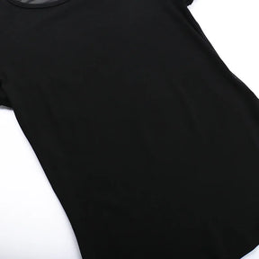 Close-up of the opaque black front panel and stitched lower edge of the angel T-shirt.