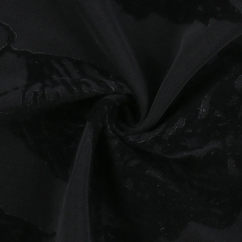Lower portion of the angel print on black mesh, showing the flowing drapery and dark outlines.