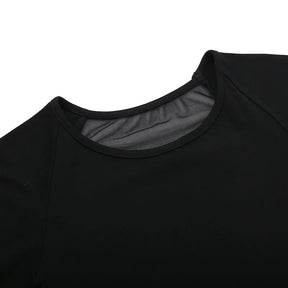 Close-up of the black T-shirt's round neckline, with the sheer back panel visible behind the opaque front.
