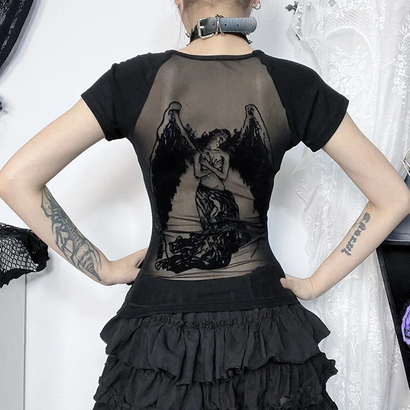 Rear waist pose showing the winged angel design across the sheer panel of the black T-shirt.