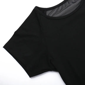 Detail of the black short sleeve, shoulder and neckline seams laid on white.