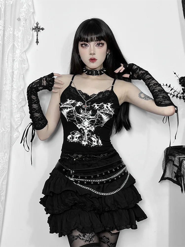Full outfit view of bat lace camisole with model raising arms