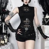Gothic cross cutout buckle top styled with black shorts