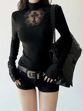 Front view of a fitted gothic top with a high neck and cross within a sheer lace panel