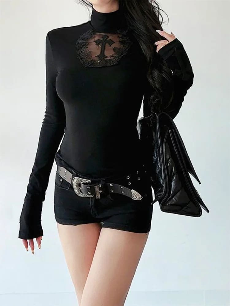 Gothic cross lace inset top styled with black shorts and a belt