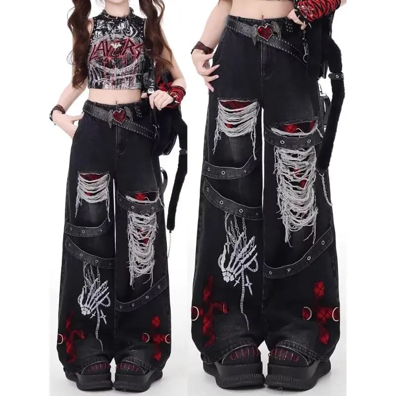 Split view of gothic distressed jeans showing the wide-leg silhouette alongside red cross graphics and eyelet details.