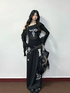 Gothic cross ruffle top styled with a long black skirt