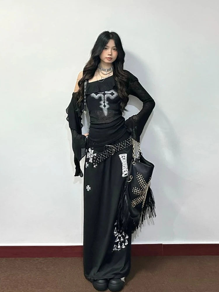 Gothic cross ruffle top styled with a long black skirt