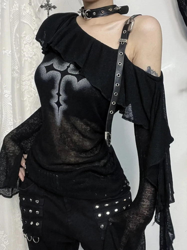 Angled view of gothic cross top with asymmetric ruffle neckline