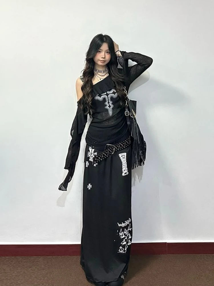 Witchy outfit with ruffled cross top and sweeping black skirt