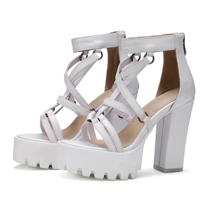 Pair of white crisscross platform sandals with chunky block heels