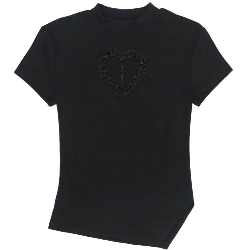 Black heart-cutout T-shirt laid flat on white, showing short sleeves, a close neckline and an angled lower edge.