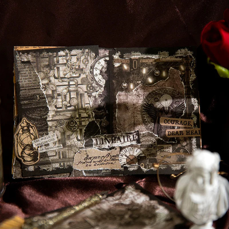 A finished gothic journal spread layered with aged paper, vintage diagrams, dark lettering and torn edges.