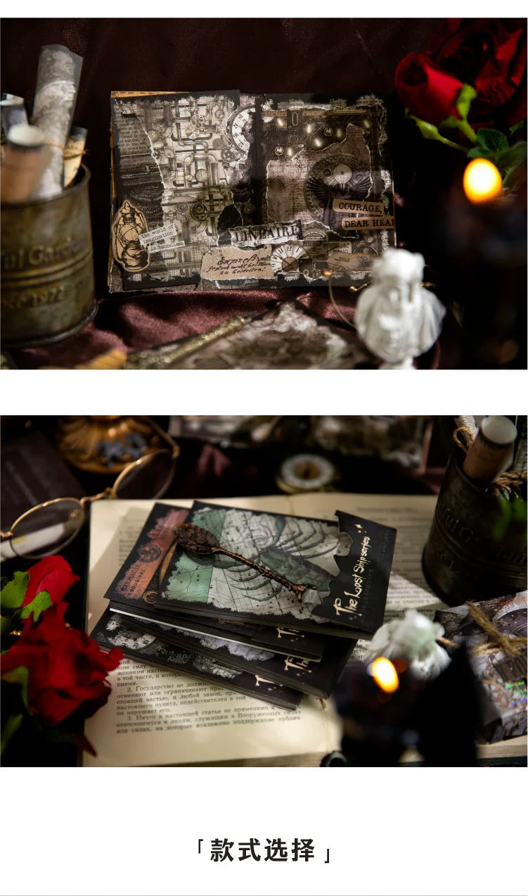 Finished gothic collage pages and a stack of decorative papers displayed in a dark tabletop arrangement.