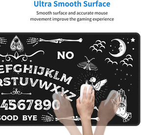 Close-up of the gothic Ouija mousepad beside a hand, with the moon, moth and winged skeleton artwork visible. An illustrated motion trail accompanies the smooth-surface feature text.