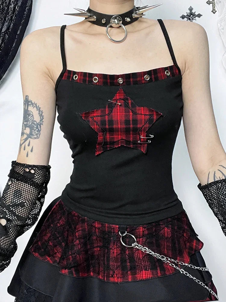 Close front view of red plaid star patch and eyelet trim on black camisole