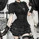 Gothic puff sleeve blouse styled with a layered black skirt