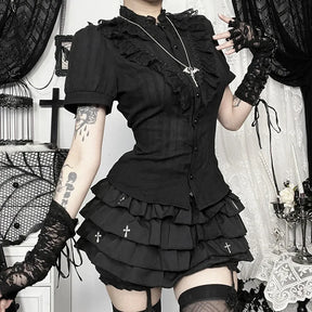 Gothic puff sleeve blouse styled with a layered black skirt