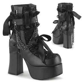 Black gothic platform ankle boots shown from front and back, with lace panels, ribbon bows and draped chains.