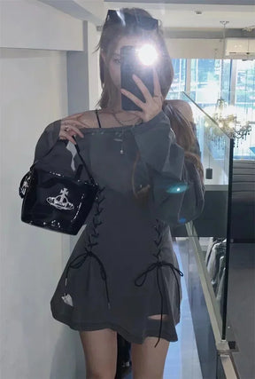 Flash mirror photo of gray gothic dress with long sleeves
