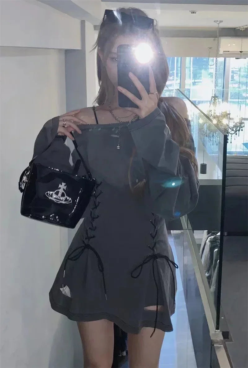 Flash mirror photo of gray gothic dress with long sleeves