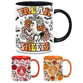 Three Halloween mug designs shown together: a large floral ghost mug above smaller red and orange Spooky Season and Spooky Vibes designs.