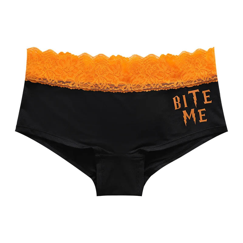 Black Halloween briefs with stacked orange Bite Me lettering and floral lace trim.