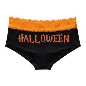 Black briefs with orange Halloween lettering beneath a scalloped orange lace waistband.