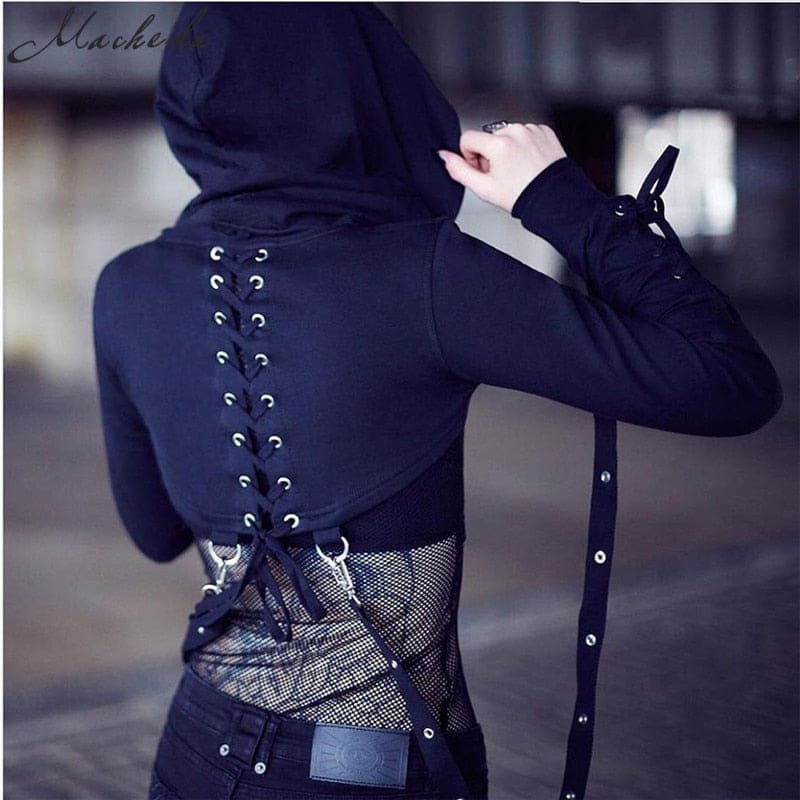 Rear view of the hooded crop shrug showing corset-style back lacing, silver-tone eyelets and straps beneath the curved cropped hem.