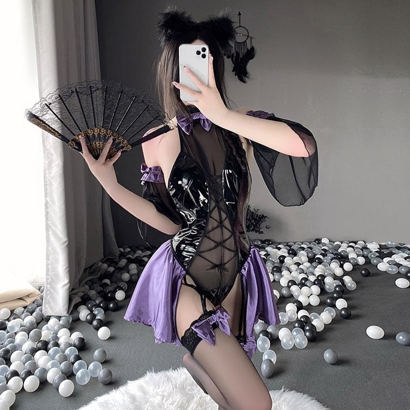 Black and purple latex succubus queen bodysuit with lace-up satin accents sheer mesh panels and matching bows