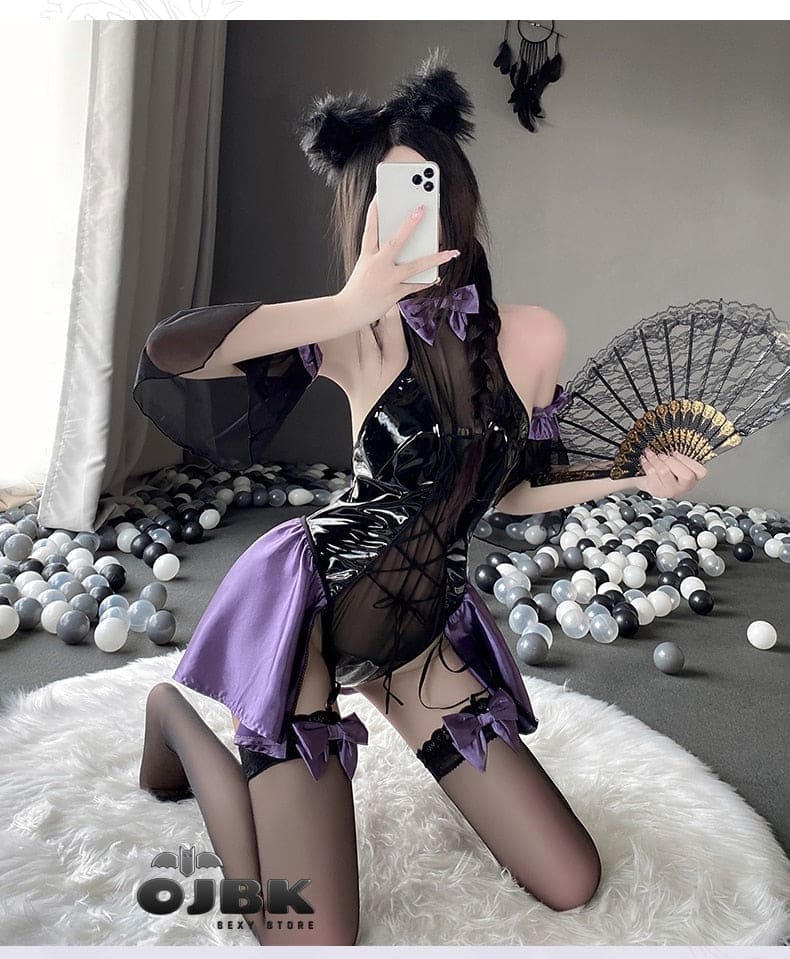 Black and purple lace latex succubus queen bodysuit with sheer mesh panels satin accents and matching bows