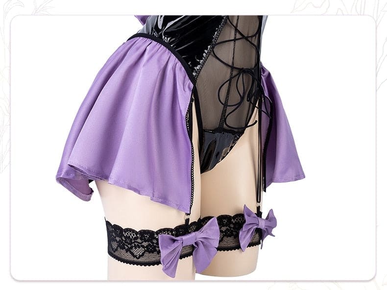 Purple satin skirt with black lace trim and bows paired with sheer black corset for latex succubus queen cosplay