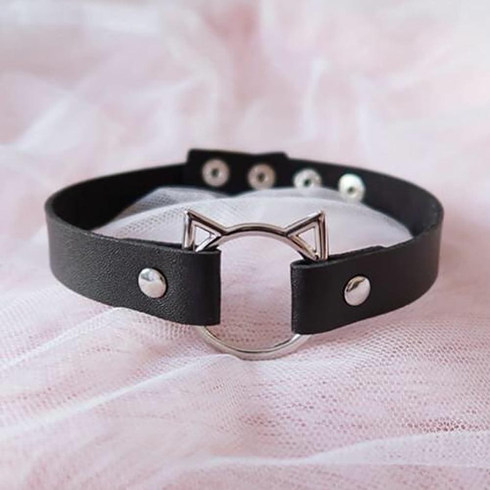 Black faux leather neko cat collar with silver cat ear buckle and matching metal studs for edgy style