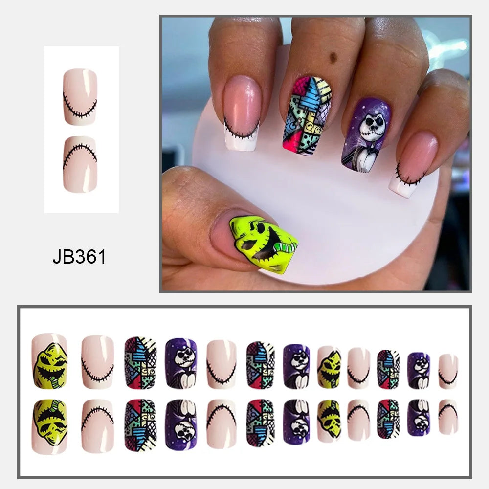 Pink square nails with neon-green and purple character graphics, contrasting black details and patterned tips, shown on a hand and in rows.
