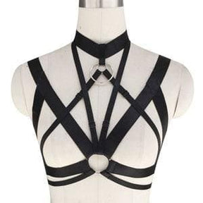 Black leather o-ring chest harness top with crisscross straps and central circular buckle