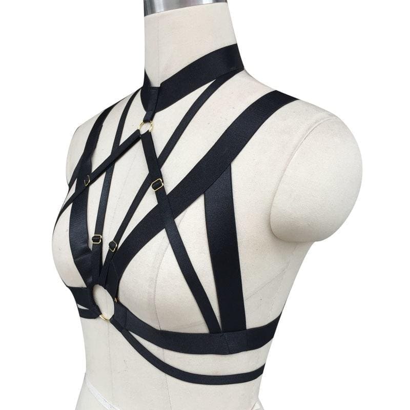 Black satin o ring chest harness with gold-toned metal buckles and rings for edgy fashion looks