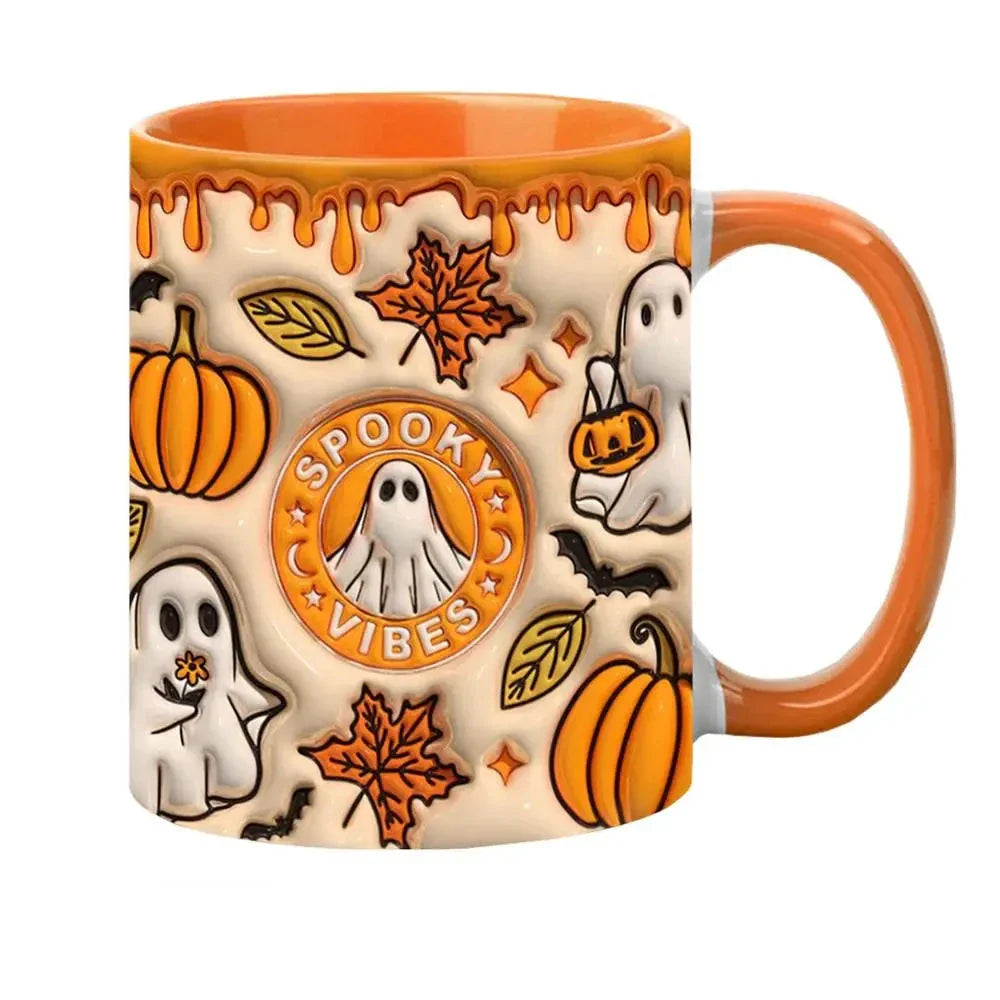 Spooky Vibes mug with an orange handle and interior, ghost artwork, pumpkins and falling autumn leaves.