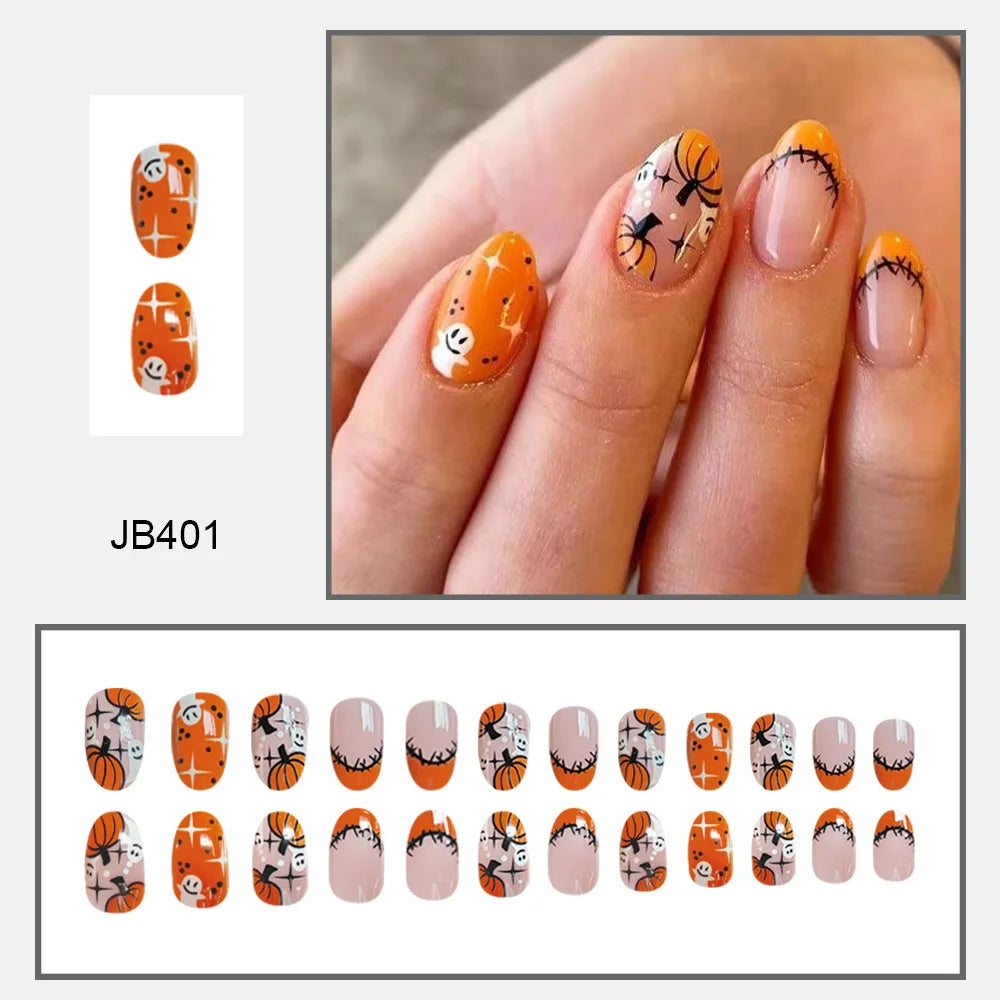 Orange and pink pointed Halloween nails with pumpkin, ghost and spiderweb artwork, shown worn beside matching nail tips.