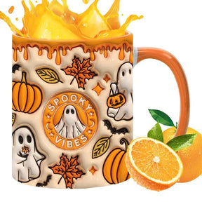 Orange-handled Spooky Vibes Halloween mug shown with a bright orange drink splash and orange slices.