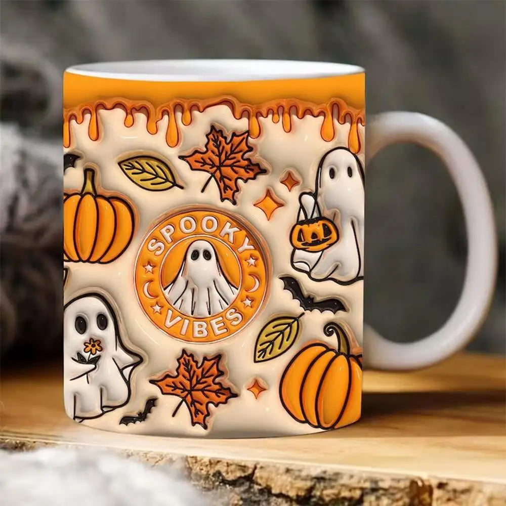 Orange Spooky Vibes mug with a white handle, printed ghosts, pumpkins and autumn leaves on a wood display.