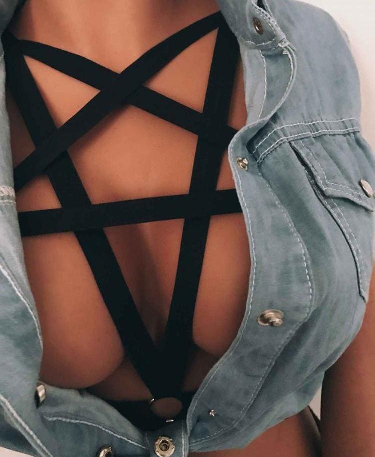 Black pentagram body harness with strappy design worn under denim jacket size fits approximately small to medium