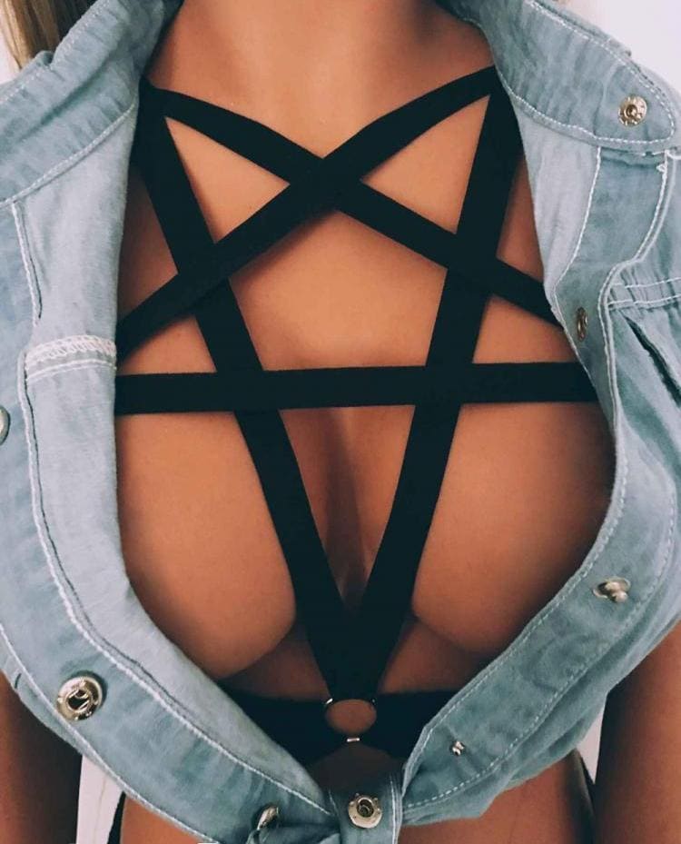 Black pentagram body harness top with strappy design and central ring size fits approximately medium to large