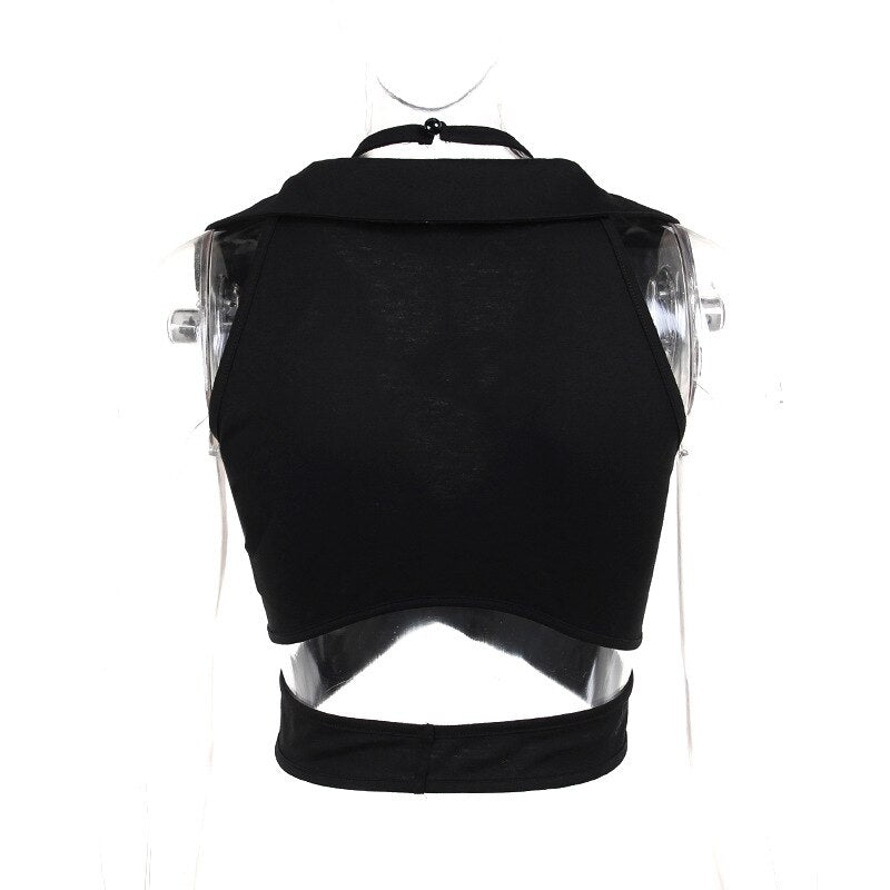 Rear mannequin view shows the black crop top's solid upper back and separate lower band with an open gap between them.