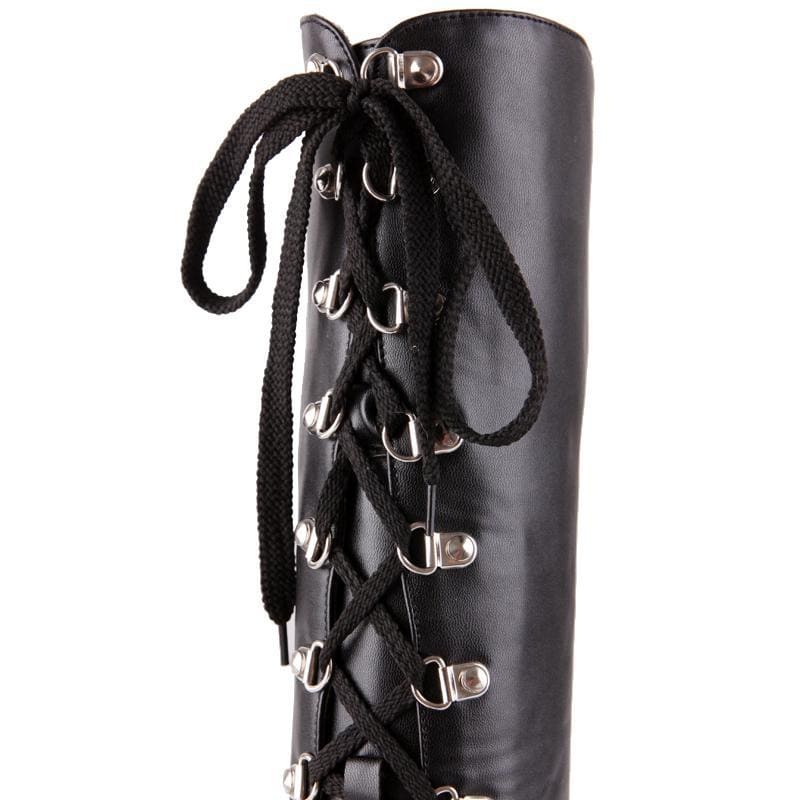 Black leather platform wedge boots with silver metal eyelets and black braided laces perfect for moto style